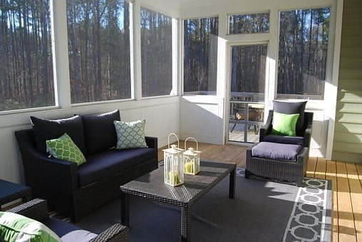 A beautiful and modern conservatory featuring a stylish roof design, demonstrating the perfect blend of architecture and nature in a sun-soaked sanctuary.
