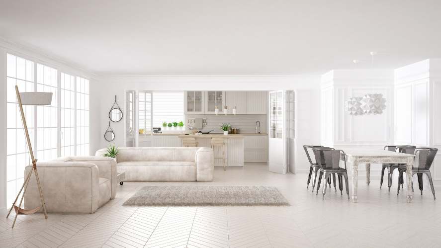 Image showcasing a minimalist living room, featuring neutral colours, natural light, and functional furniture layout.